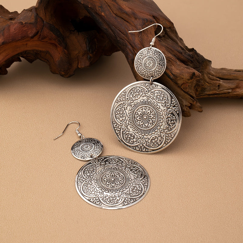 Radiant Carved Round Earrings