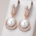 Iconic Rose Gold Pearl Dangle Earrings