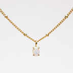Gold Beaded Necklace with Opal Pendant