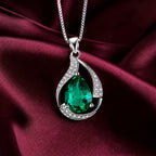 Emerald Whisper Pendant Necklace